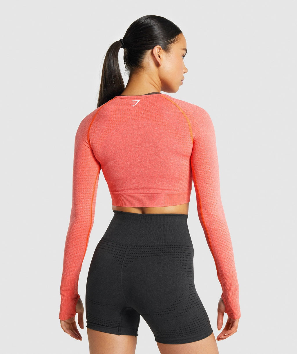 gymshark-vital-seamless-long-sleeve-crop-top-orange-marl-logo
