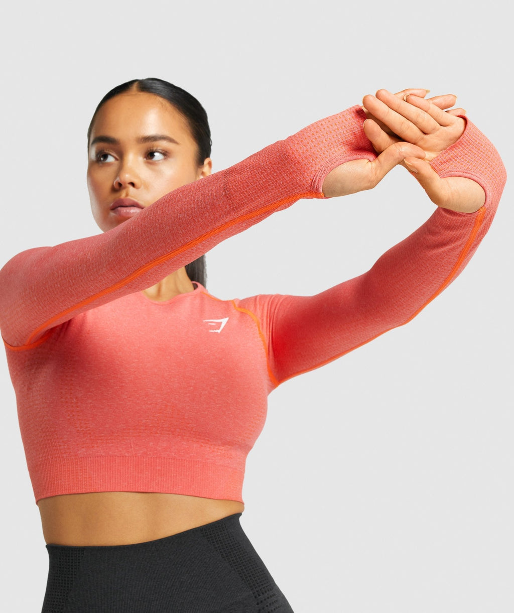 gymshark-vital-seamless-long-sleeve-crop-top-orange-marl-logo