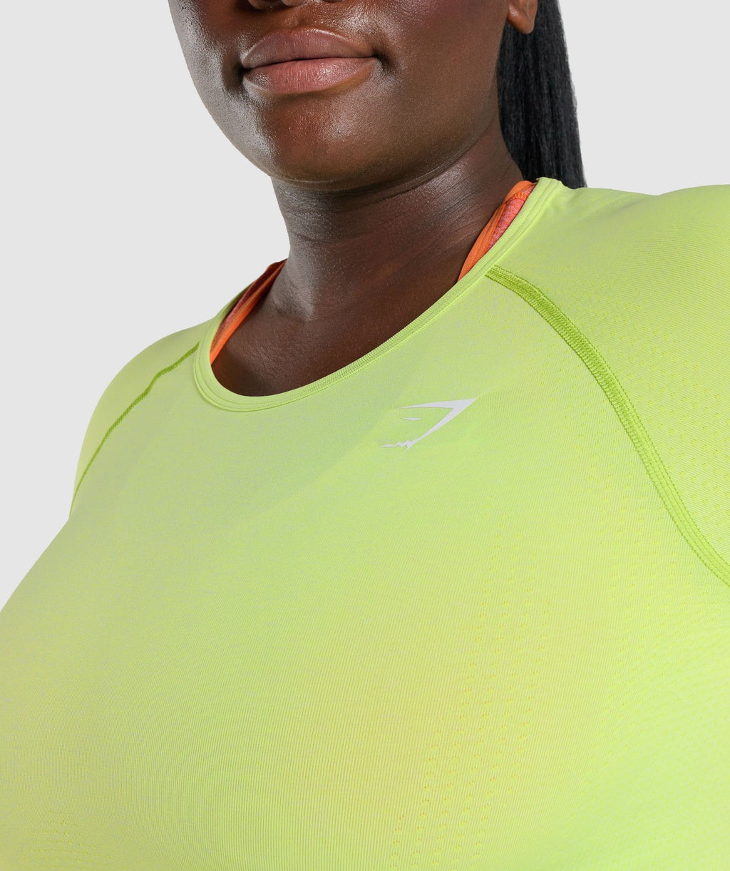 gymshark-vital-seamless-long-sleeve-crop-top-yellow-marl-logo