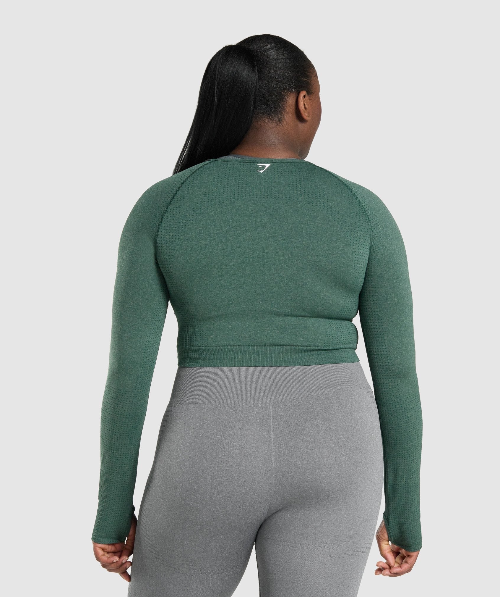 gymshark-vital-seamless-long-sleeve-crop-top-dark-green-marl-logo
