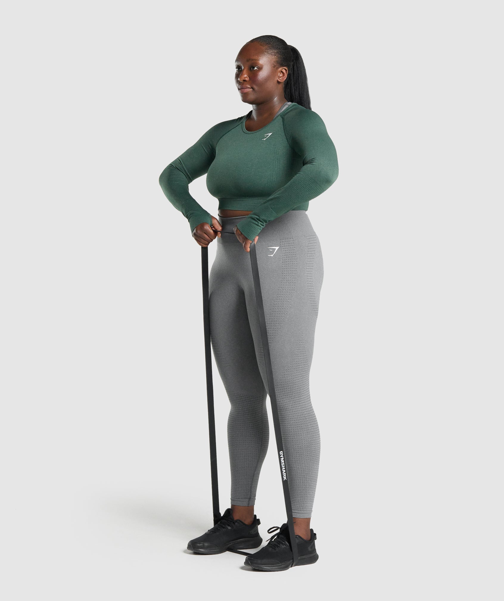 gymshark-vital-seamless-long-sleeve-crop-top-dark-green-marl-logo