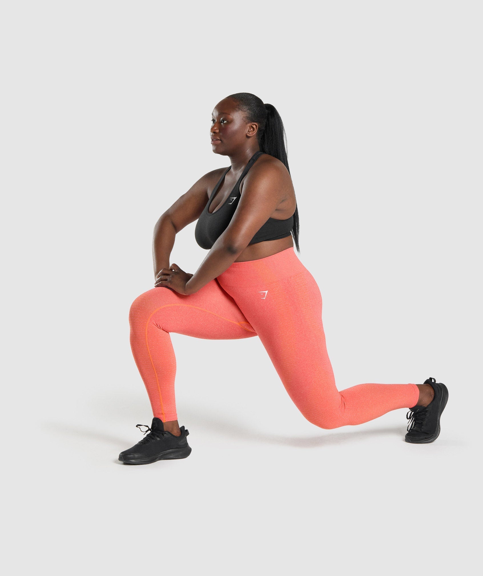 gymshark-vital-seamless-leggings-orange-marl-logo