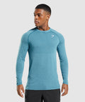 gymshark-vital-light-long-sleeve-t-shirt-tahoe-teal-marl-ss22