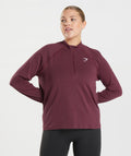gymshark-vital-seamless-2-0-1-2-zip-pullover-baked-maroon-marl-aw22