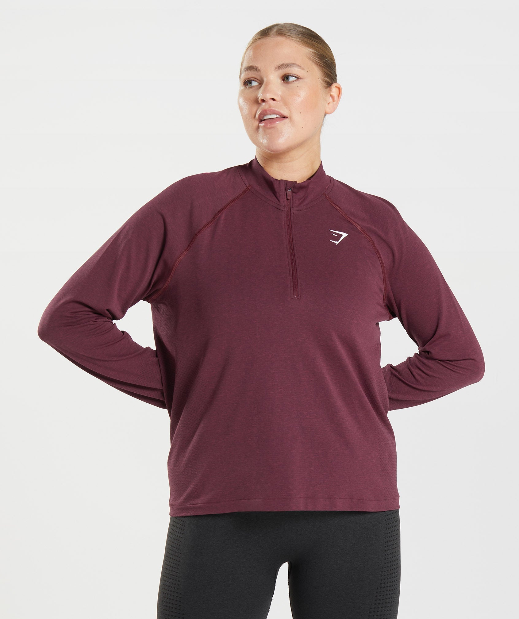 gymshark-vital-seamless-2-0-1-2-zip-pullover-baked-maroon-marl-aw22