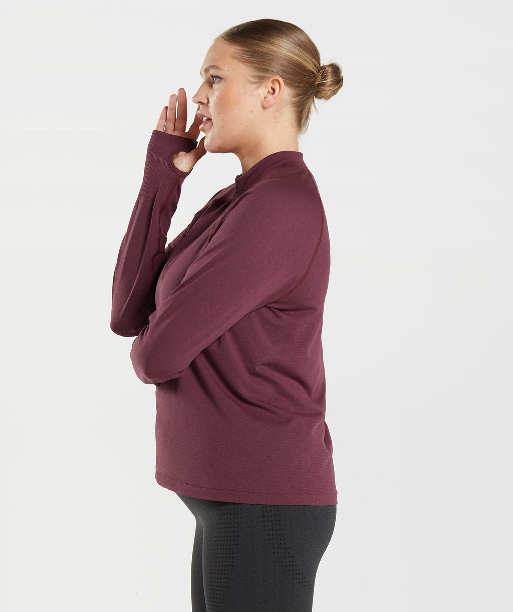 gymshark-vital-seamless-2-0-1-2-zip-pullover-baked-maroon-marl-aw22
