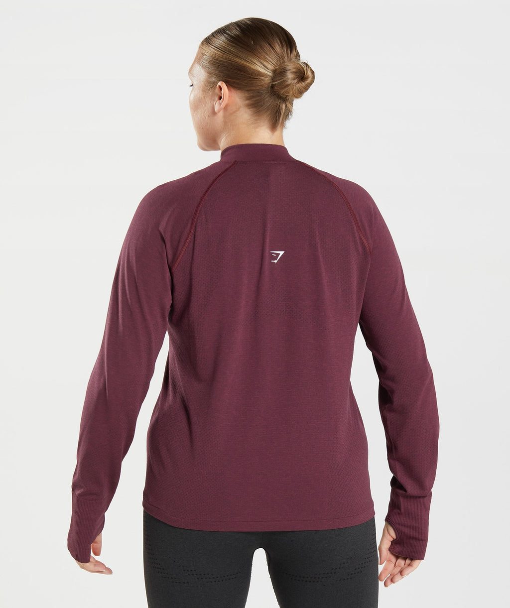 gymshark-vital-seamless-2-0-1-2-zip-pullover-baked-maroon-marl-aw22
