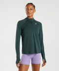 gymshark-vital-seamless-1-2-zip-woodland-green-marl-aw22