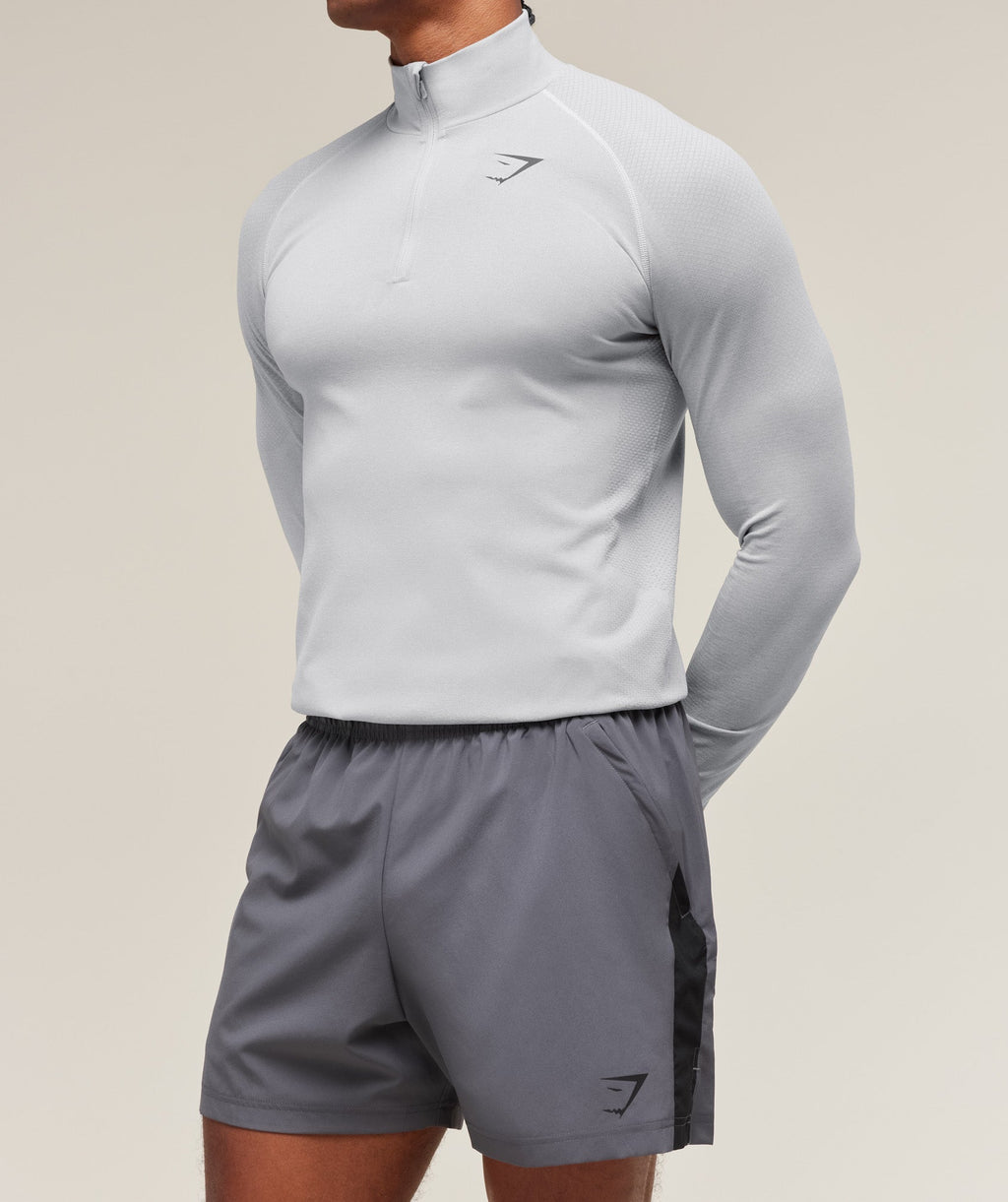 gymshark-vital-seamless-1-4-zip-light-grey-smokey-grey-aw23