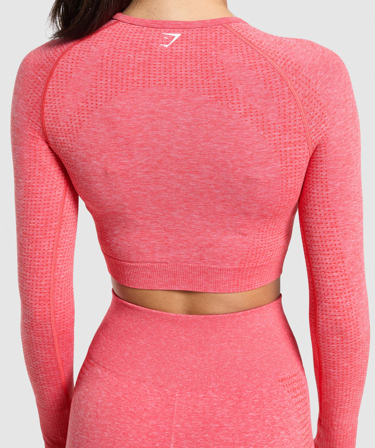 gymshark-vital-seamless-2-0-crop-top-coral-red-marl-ss25