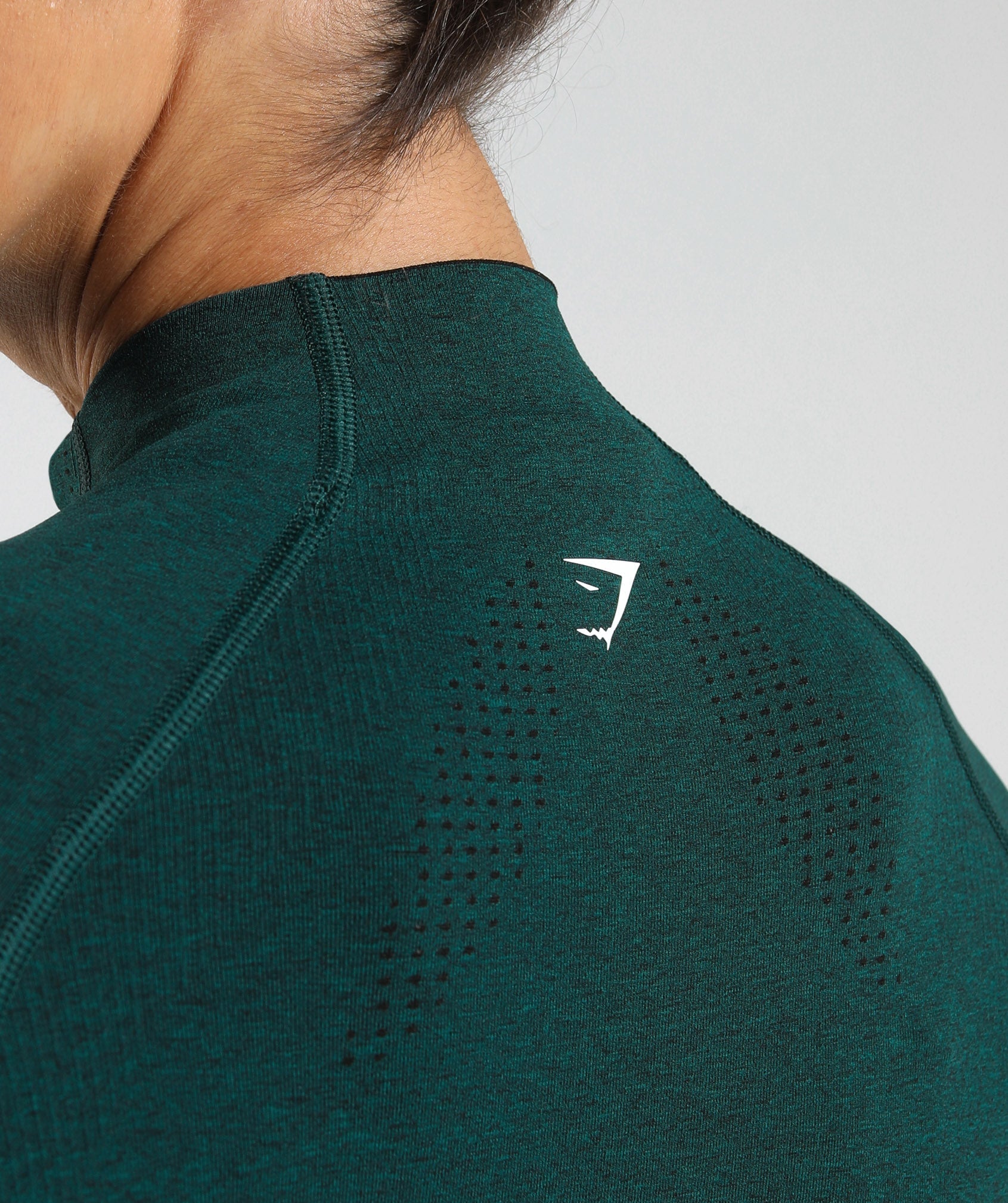 gymshark-vital-seamless-2-0-midi-zip-up-jacket-deep-teal-marl-aw23
