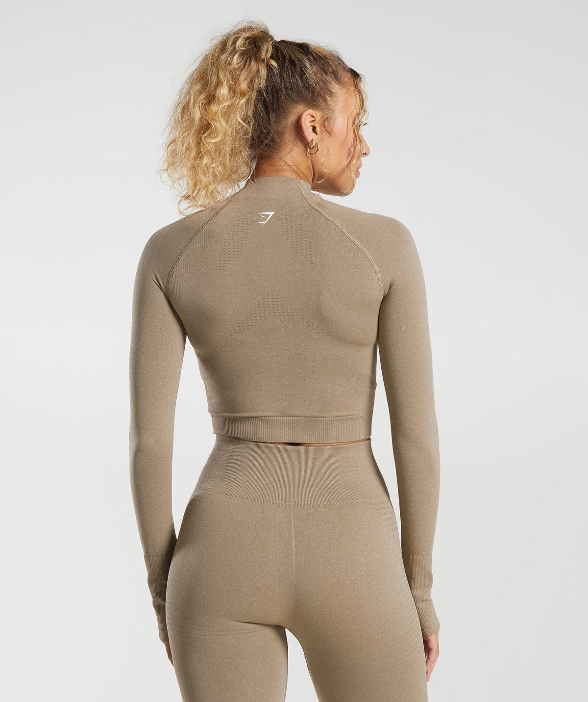 gymshark-vital-seamless-2-0-midi-zip-up-jacket-vanilla-brown-marl-aw23