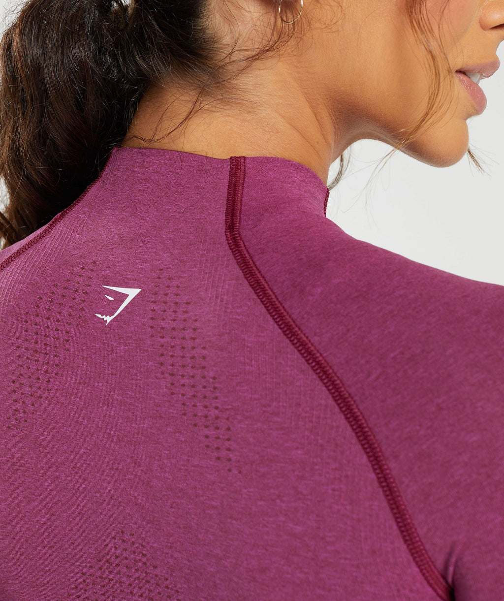 gymshark-vital-seamless-2-0-midi-zip-up-jacket-plum-pink-marl-aw23