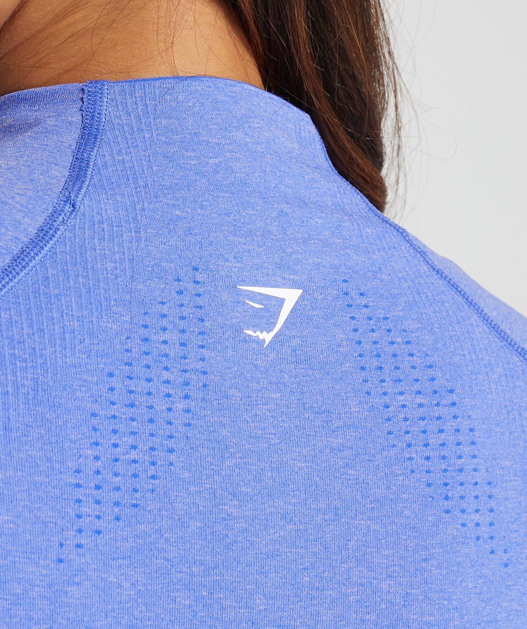gymshark-vital-seamless-midi-zip-pullover-lift-blue-marl-aw24