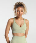 gymshark-vital-seamless-2-0-v-neck-sports-bra-light-sage-green-marl-aw23