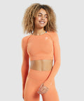 gymshark-vital-seamless-2-0-long-sleeve-crop-top-apricot-orange-marl-ss22