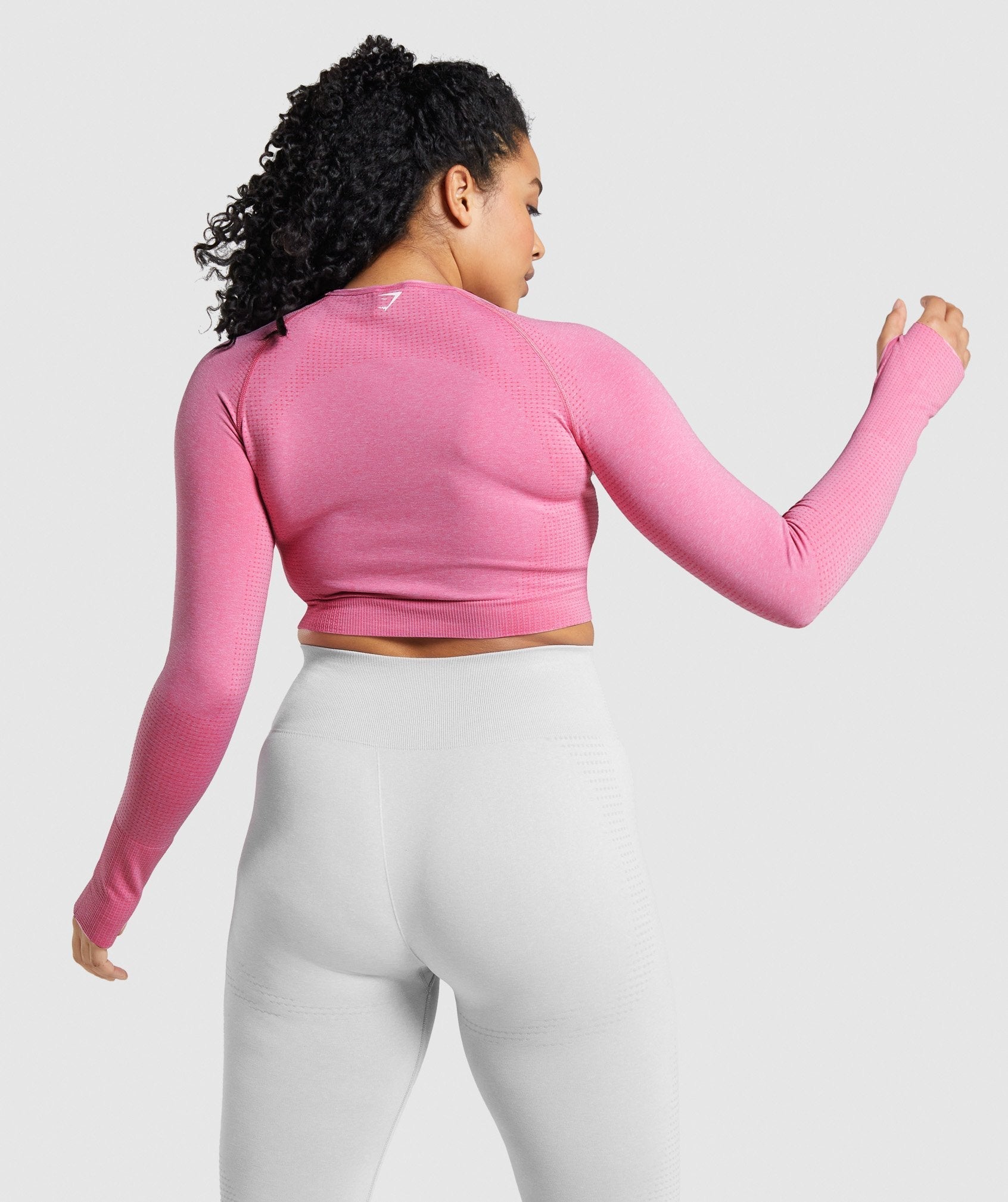 gymshark-vital-seamless-long-sleeve-crop-top-pink-marl-white-logo
