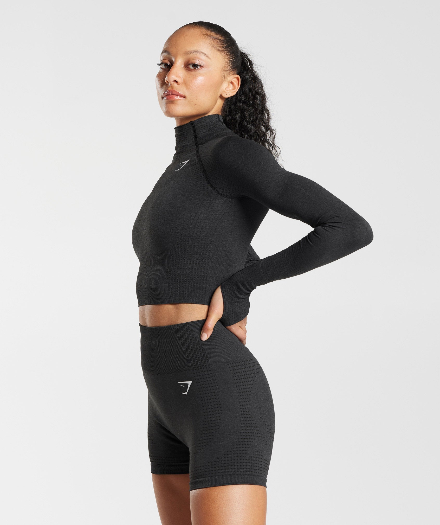 gymshark-vital-seamless-2-0-high-neck-midi-top-black-marl-aw22
