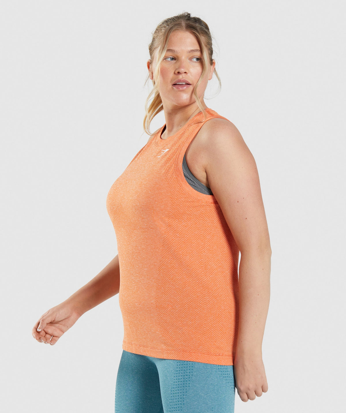 gymshark-vital-seamless-2-0-light-tank-apricot-orange-marl-ss22
