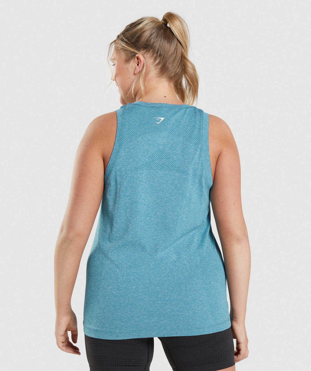 gymshark-vital-seamless-2-0-light-tank-tahoe-teal-marl-ss22