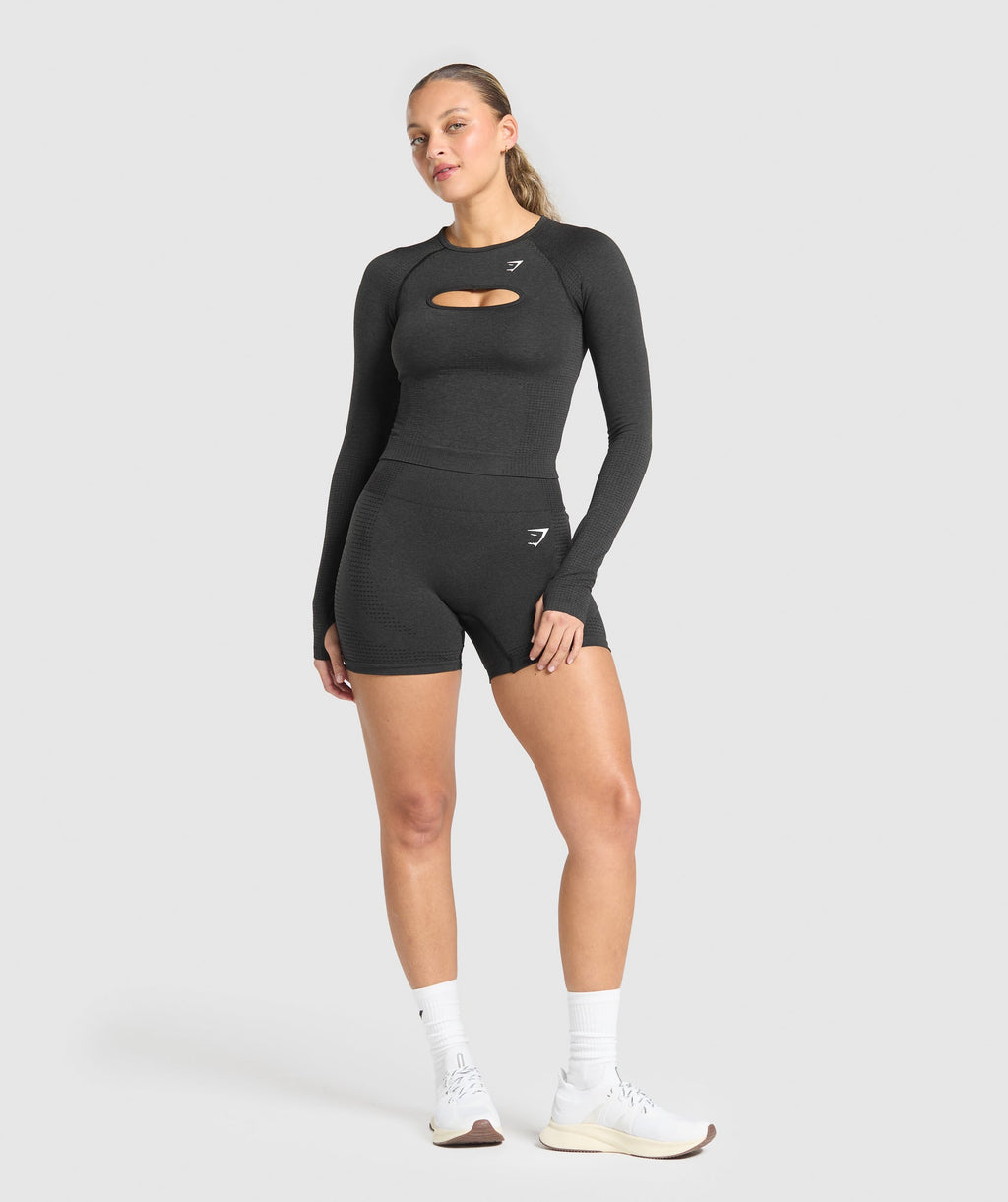 gymshark-vital-seamless-long-sleeve-cut-out-top-black-marl-ss25