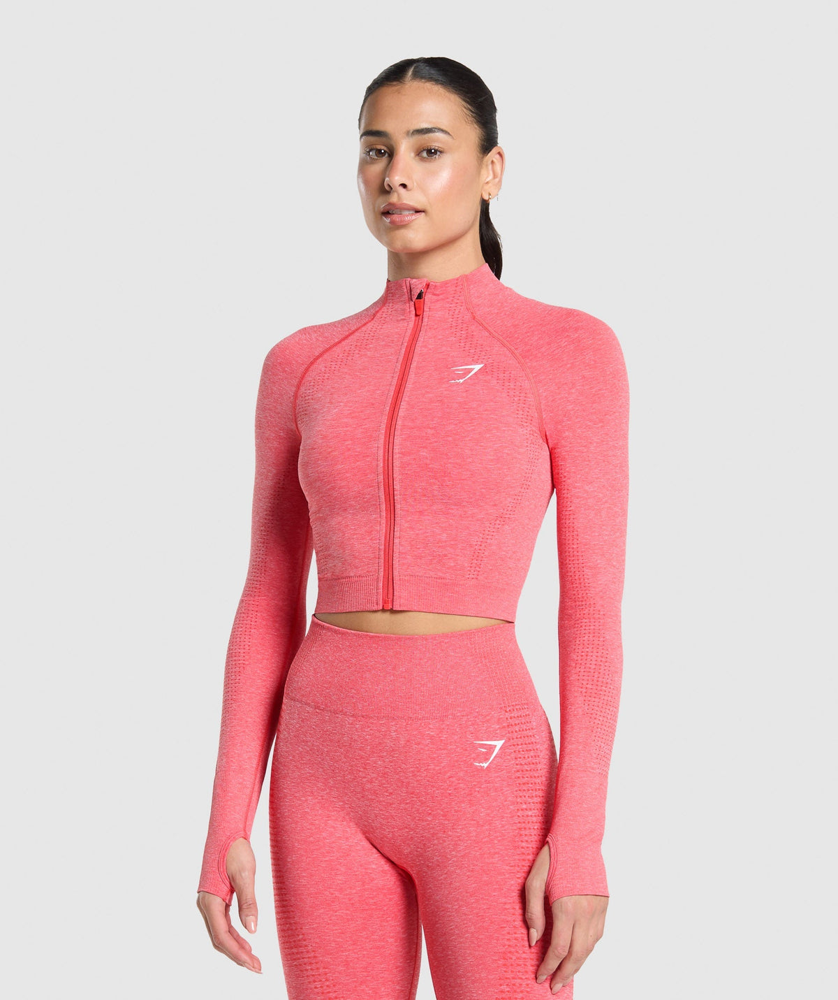 gymshark-vital-seamless-midi-zip-2-0-pullover-coral-red-marl-ss25