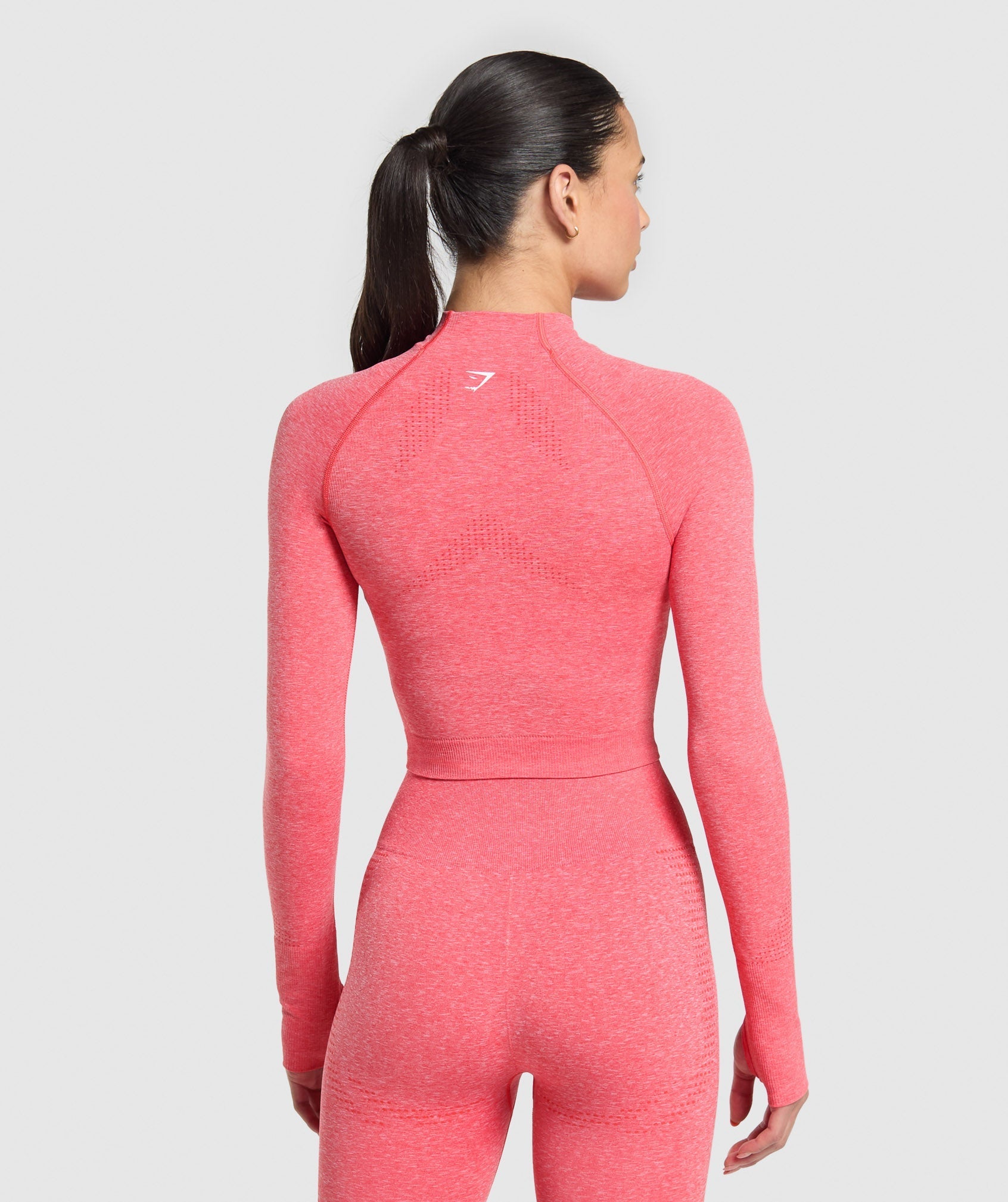 gymshark-vital-seamless-midi-zip-2-0-pullover-coral-red-marl-ss25