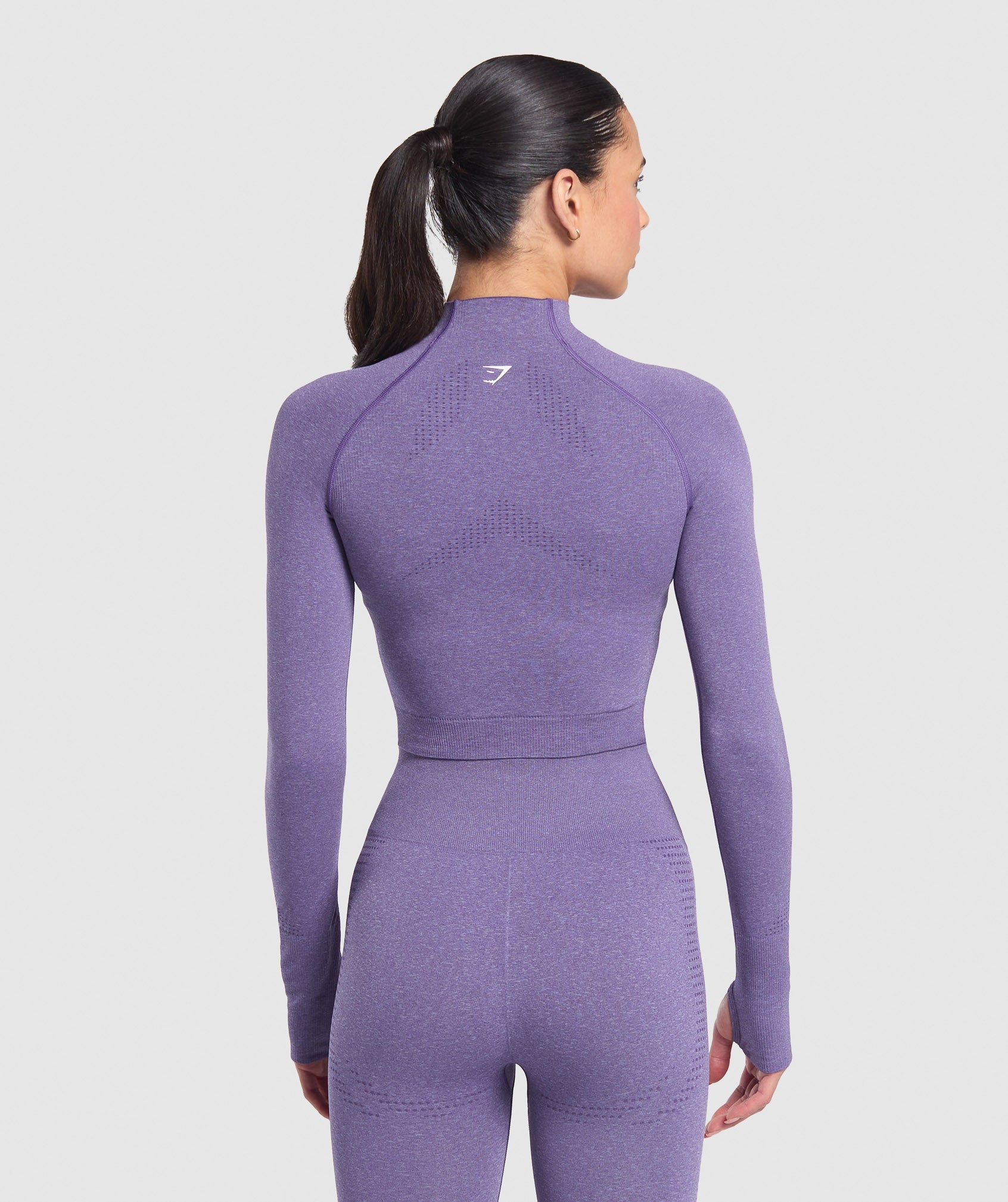 gymshark-vital-seamless-midi-zip-2-0-pullover-functional-purple-marl-ss25