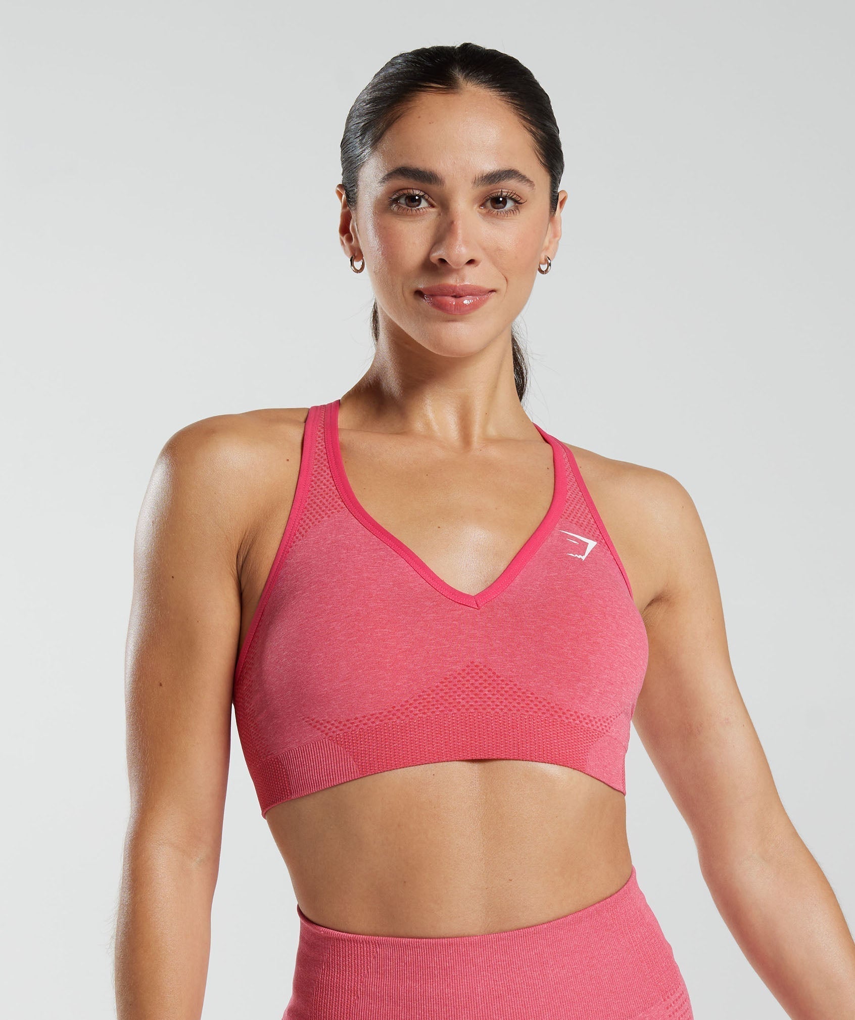 gymshark-vital-seamless-2-0-v-neck-sports-bra-bright-fuchsia-marl-ss23