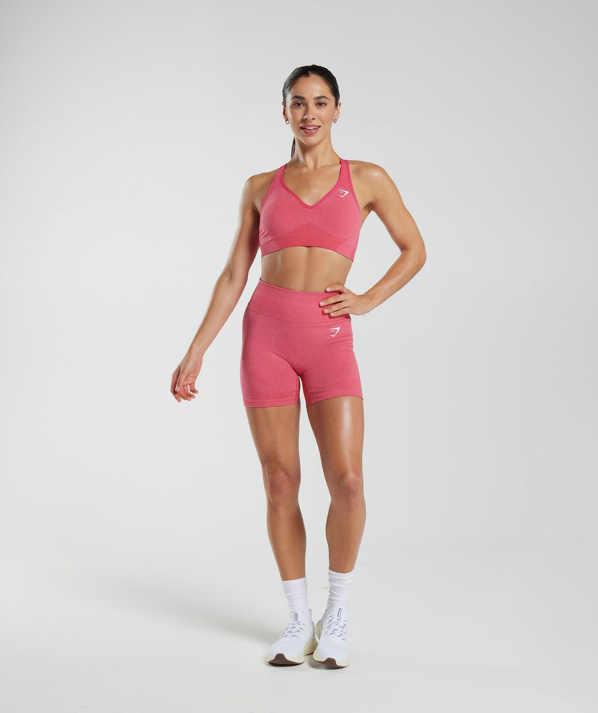 gymshark-vital-seamless-2-0-v-neck-sports-bra-bright-fuchsia-marl-ss23