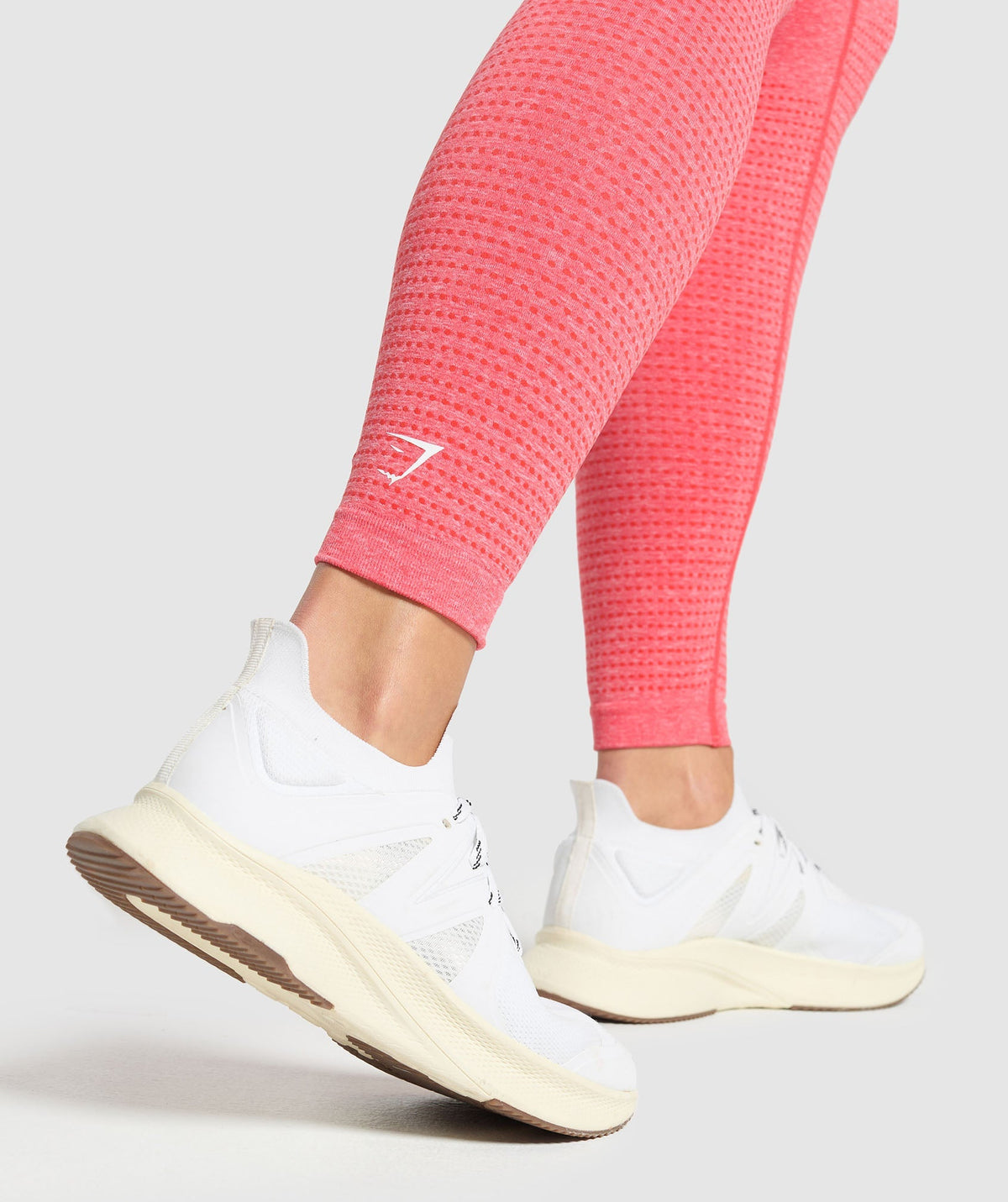 gymshark-vital-seamless-leggings-coral-red-marl-ss25