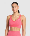gymshark-vital-seamless-v-neck-sports-bra-coral-red-marl-ss25