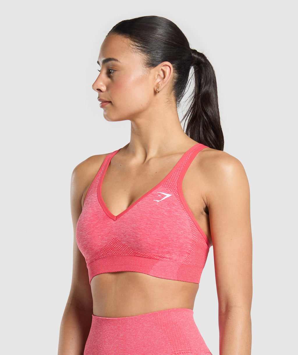 gymshark-vital-seamless-v-neck-sports-bra-coral-red-marl-ss25