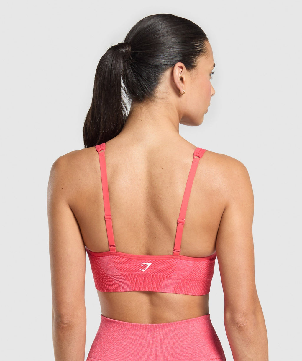 gymshark-vital-seamless-v-neck-sports-bra-coral-red-marl-ss25
