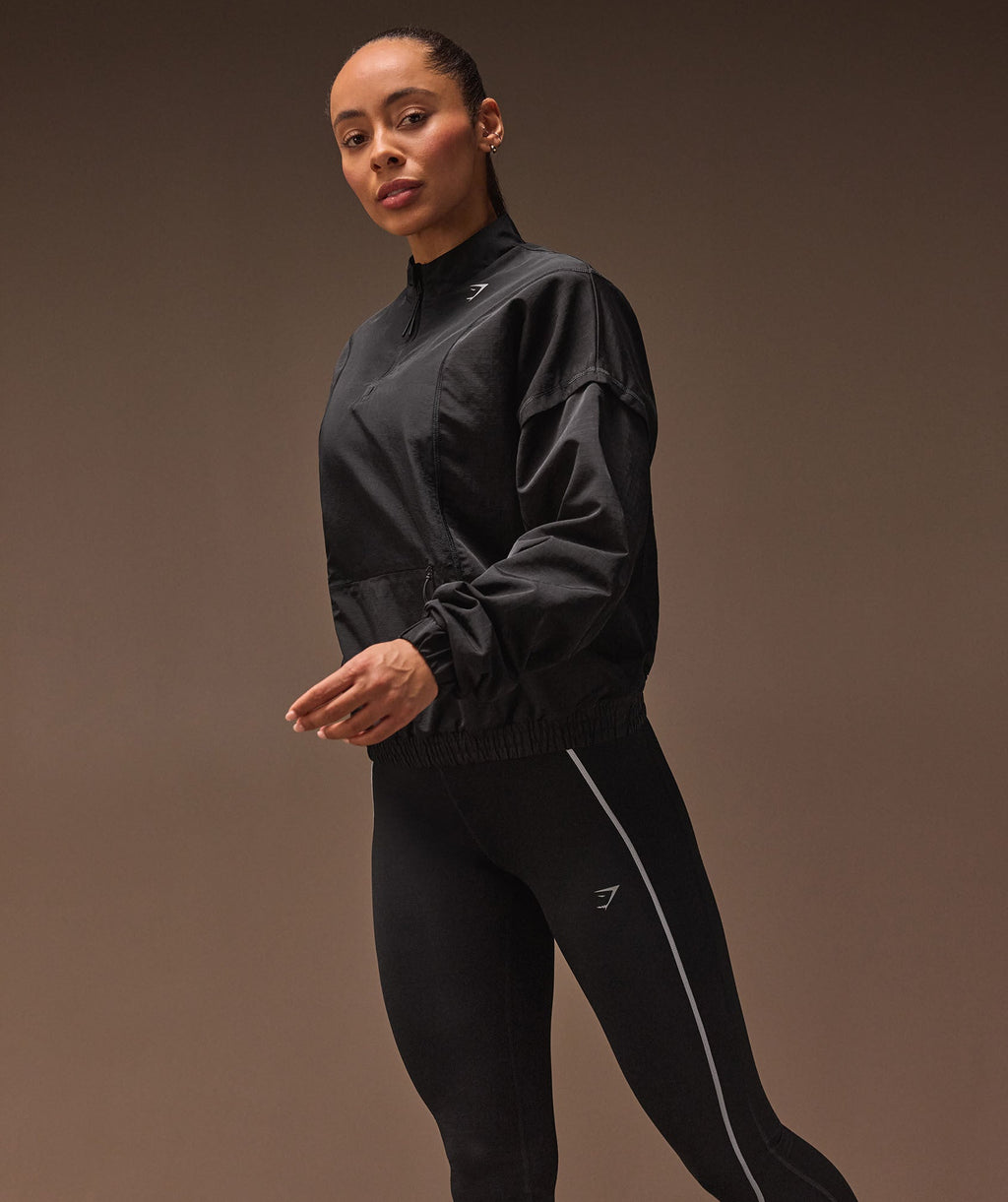 gymshark-running-1-4-zip-track-top-black-aw24