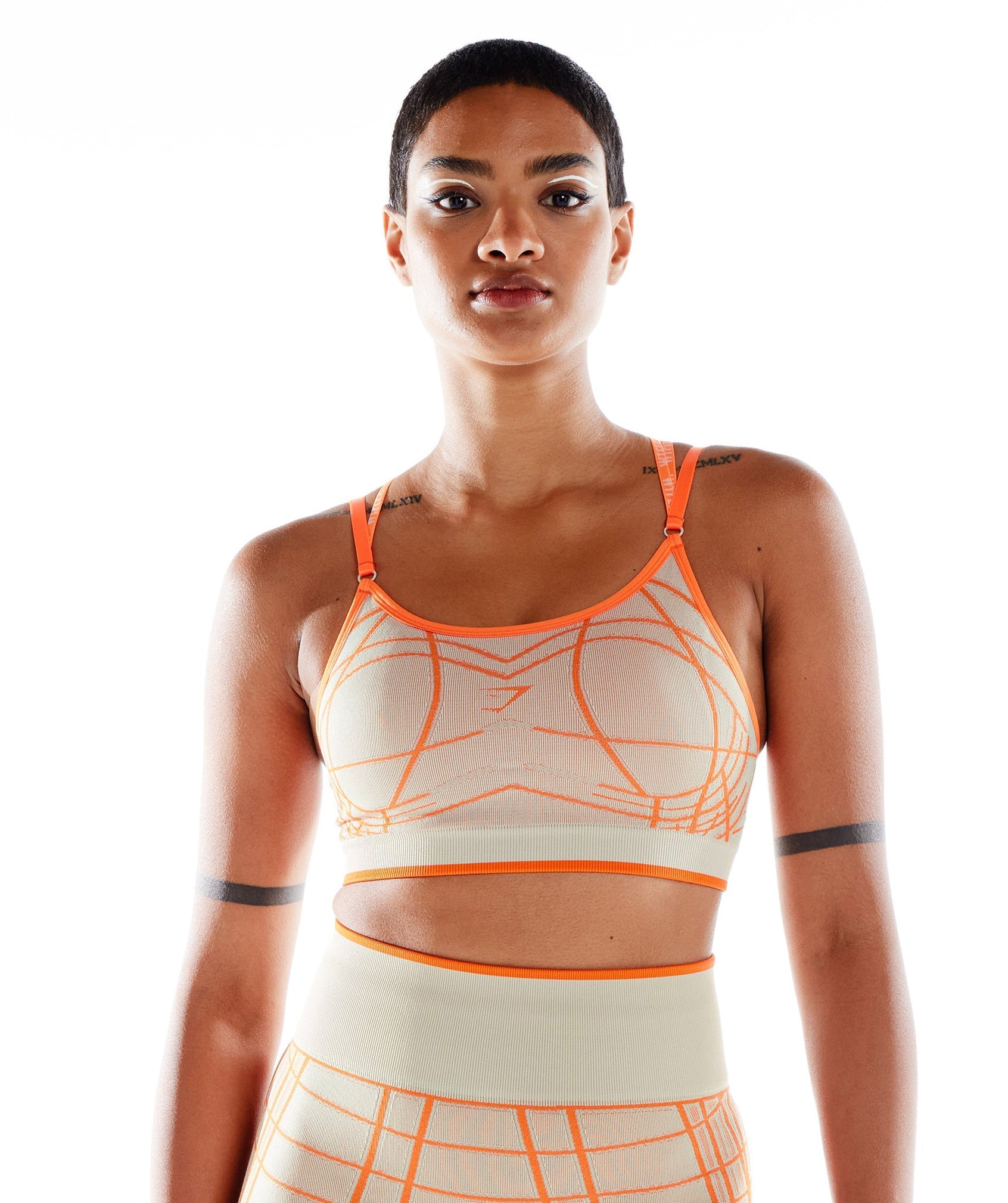 gymshark-wtflex-linear-seamless-sports-bra-pebble-grey-orange-coconut-white-ss22