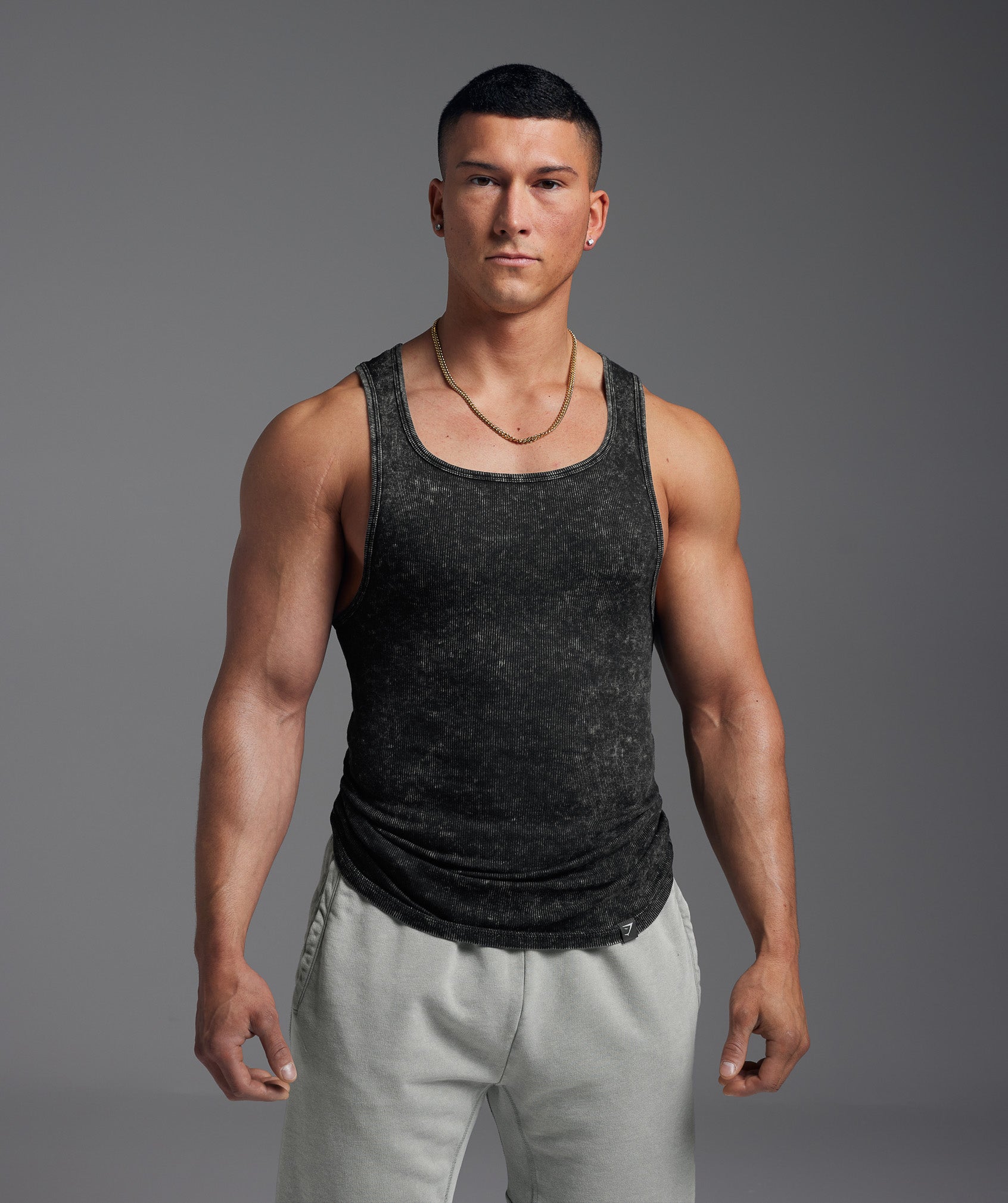 gymshark-washed-ribbed-tank-1pk-black-gel-bleach-wash-ss24
