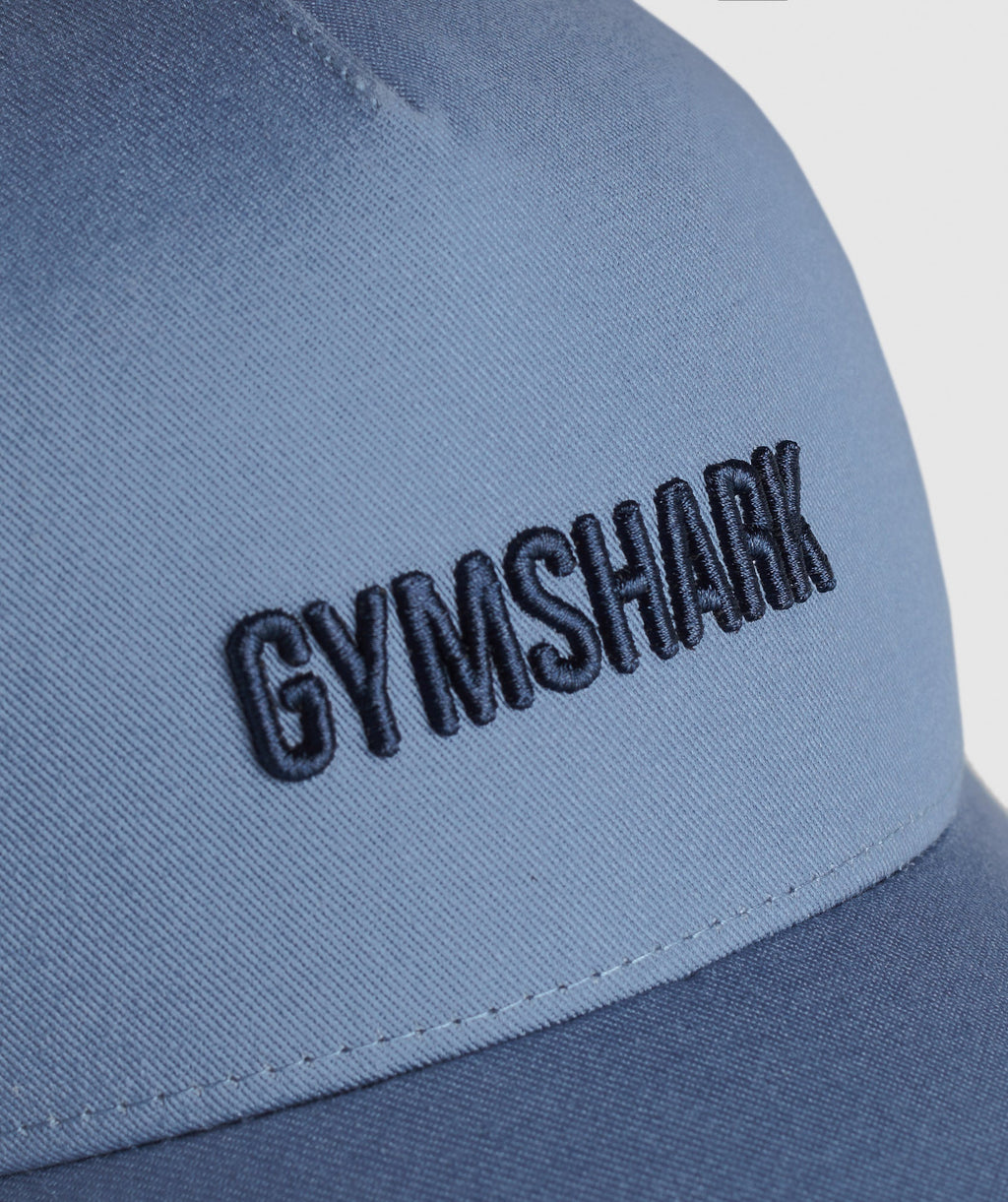 gymshark-wordmark-trucker-cap-faded-blue-ss24