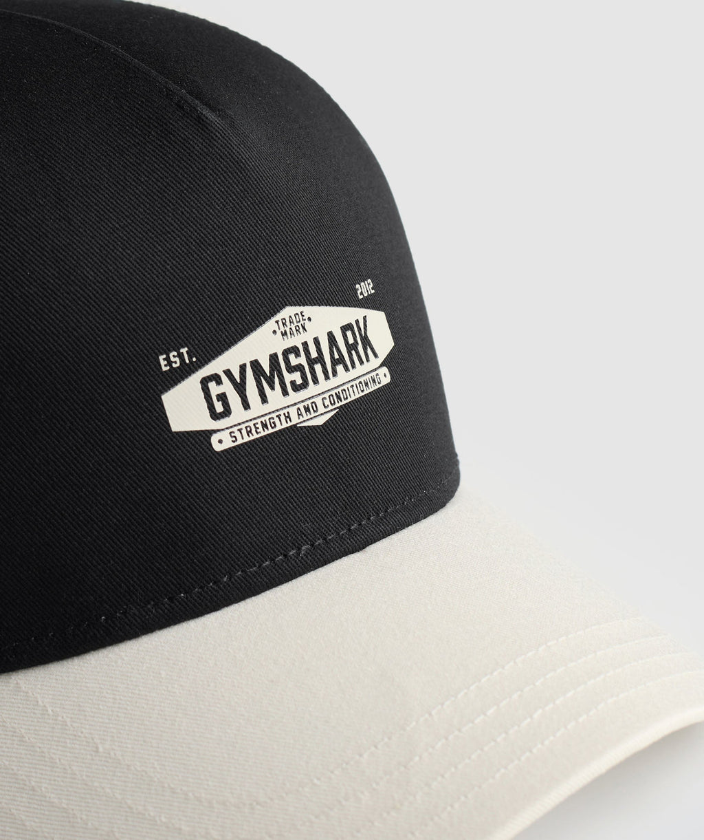 gymshark-craft-trucker-oat-white-black-ss25