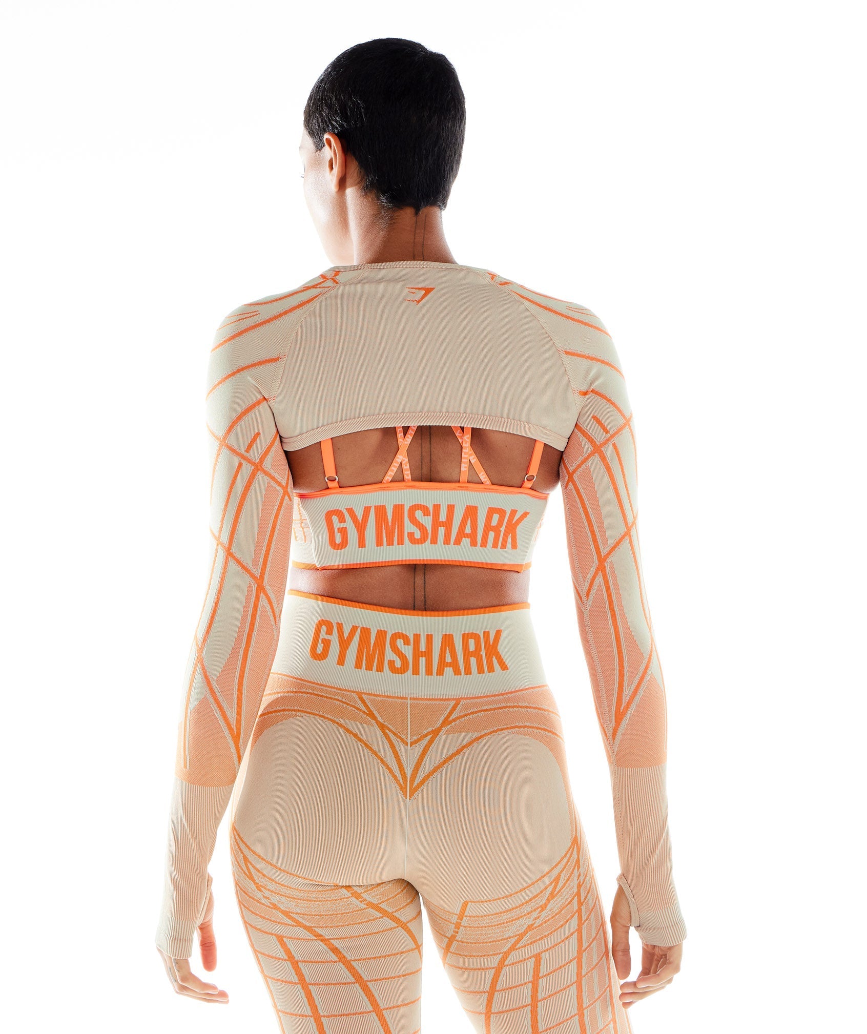 gymshark-wtflex-linear-seamless-long-sleeve-shrug-pebble-grey-orange-coconut-white-ss22