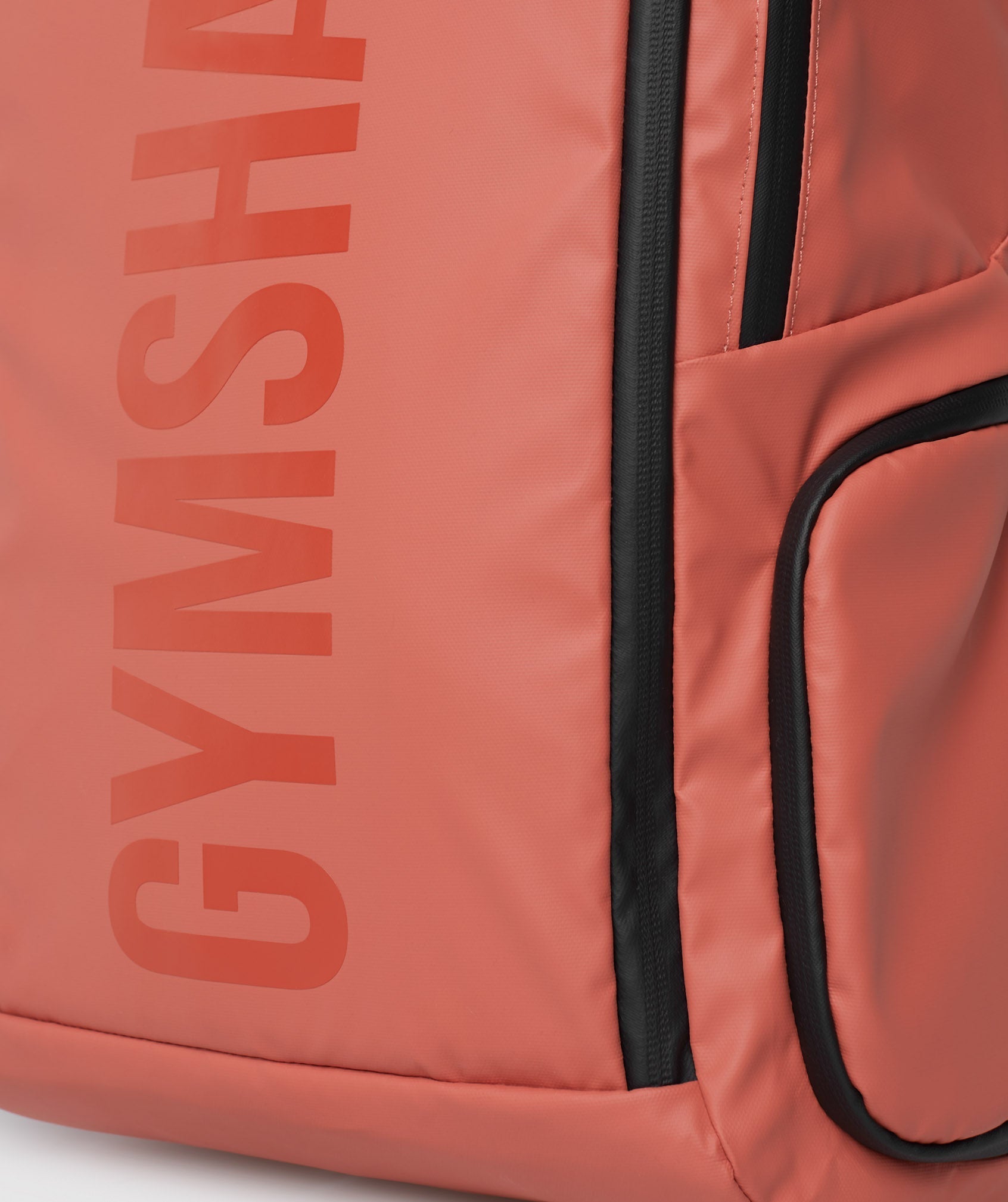 gymshark-xseries-0-3-backpack-persimmon-red-ss23