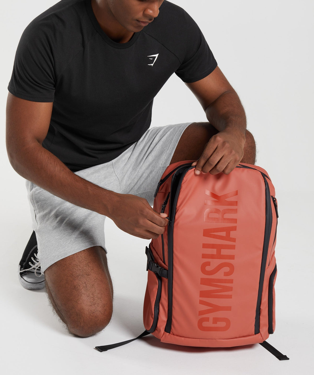 gymshark-xseries-0-3-backpack-persimmon-red-ss23