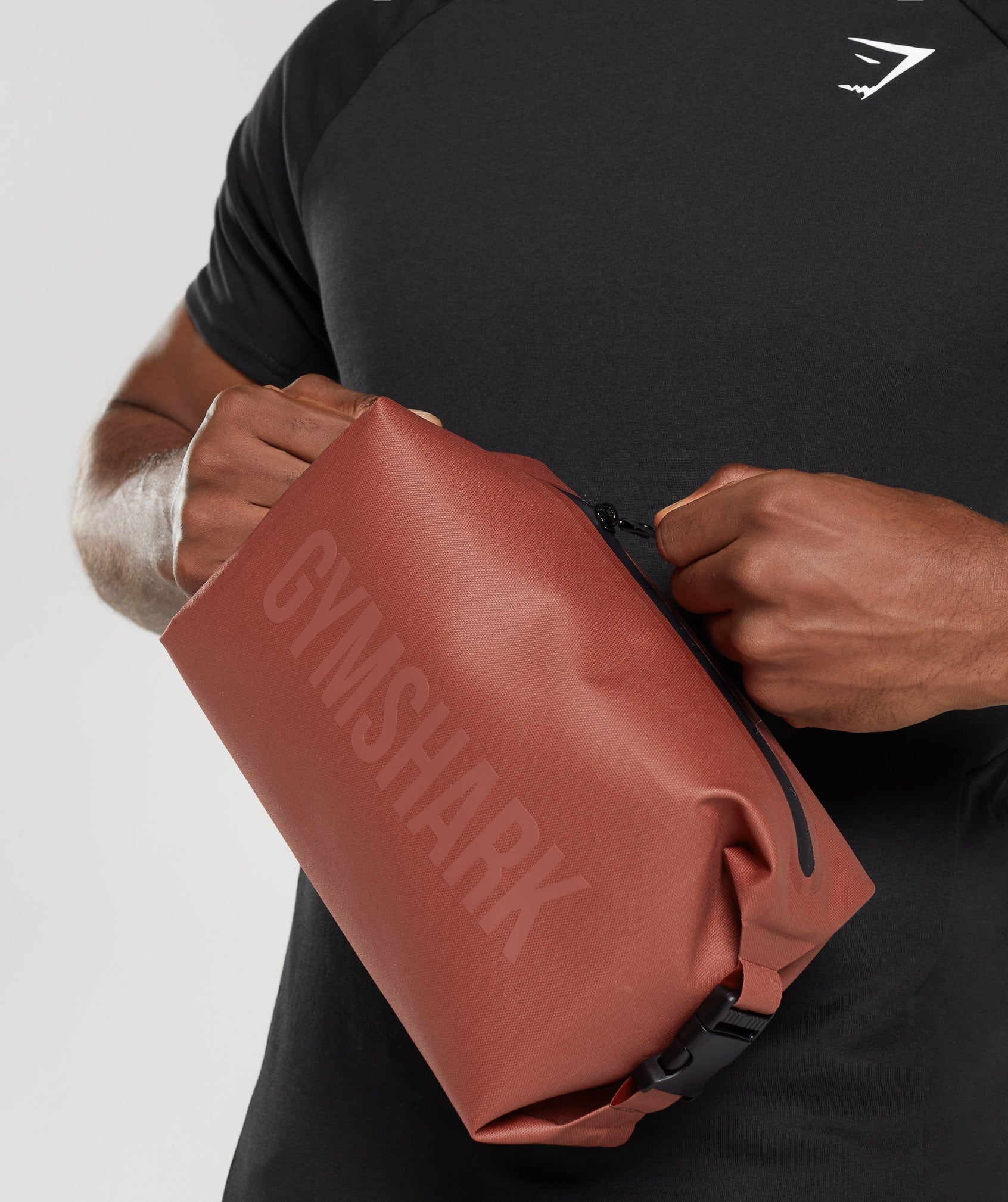 gymshark-xseries-wash-bag-persimmon-red-ss23