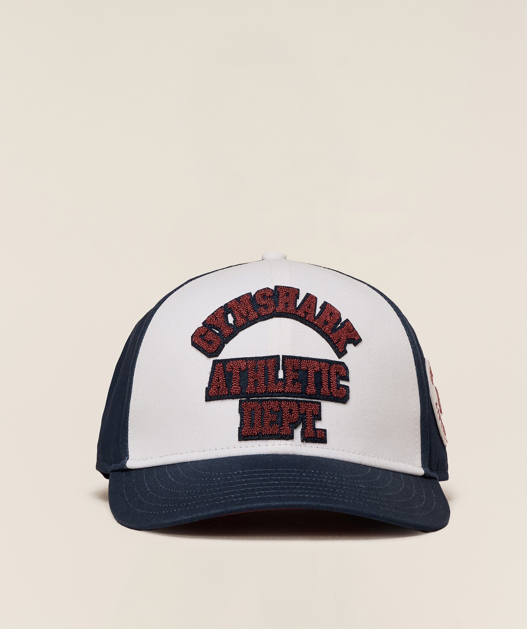gymshark-6-panel-collegiate-trucker-headwear-blue-aw25