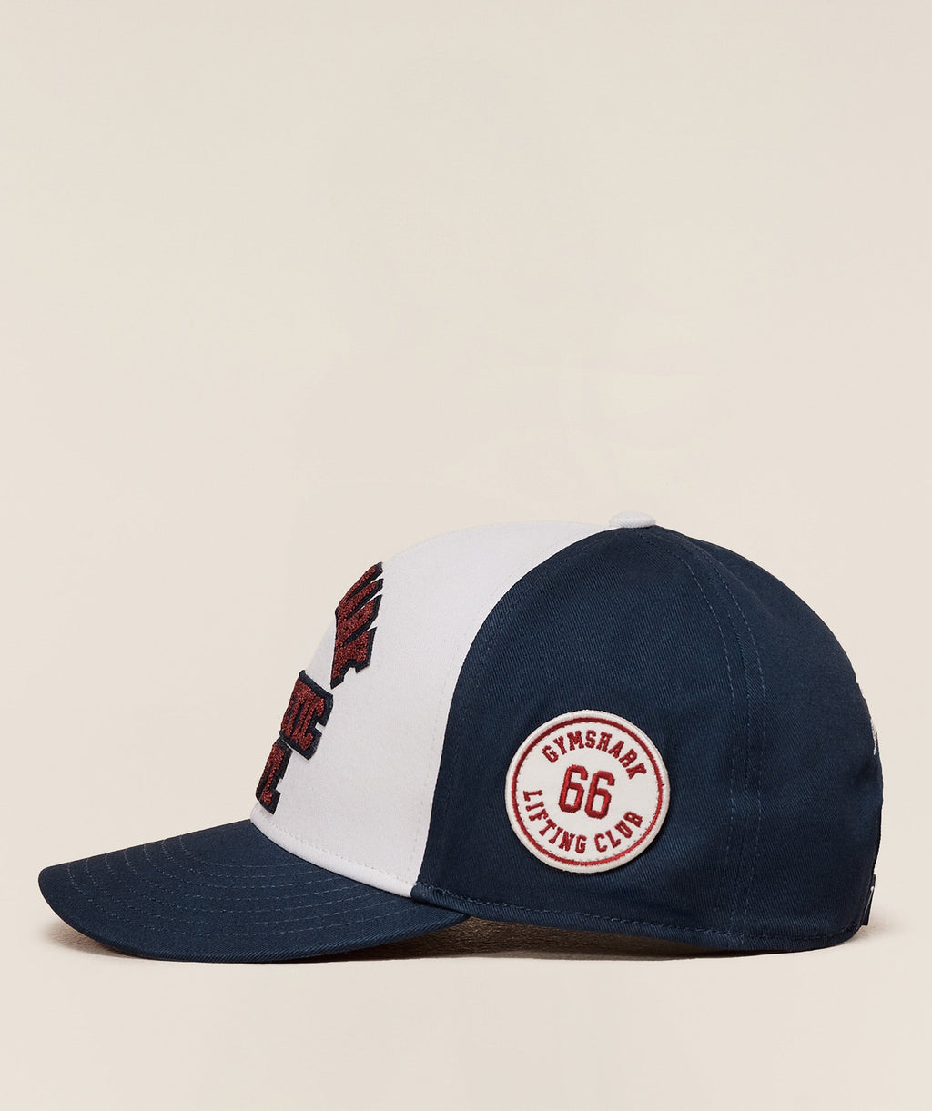 gymshark-6-panel-collegiate-trucker-headwear-blue-aw25
