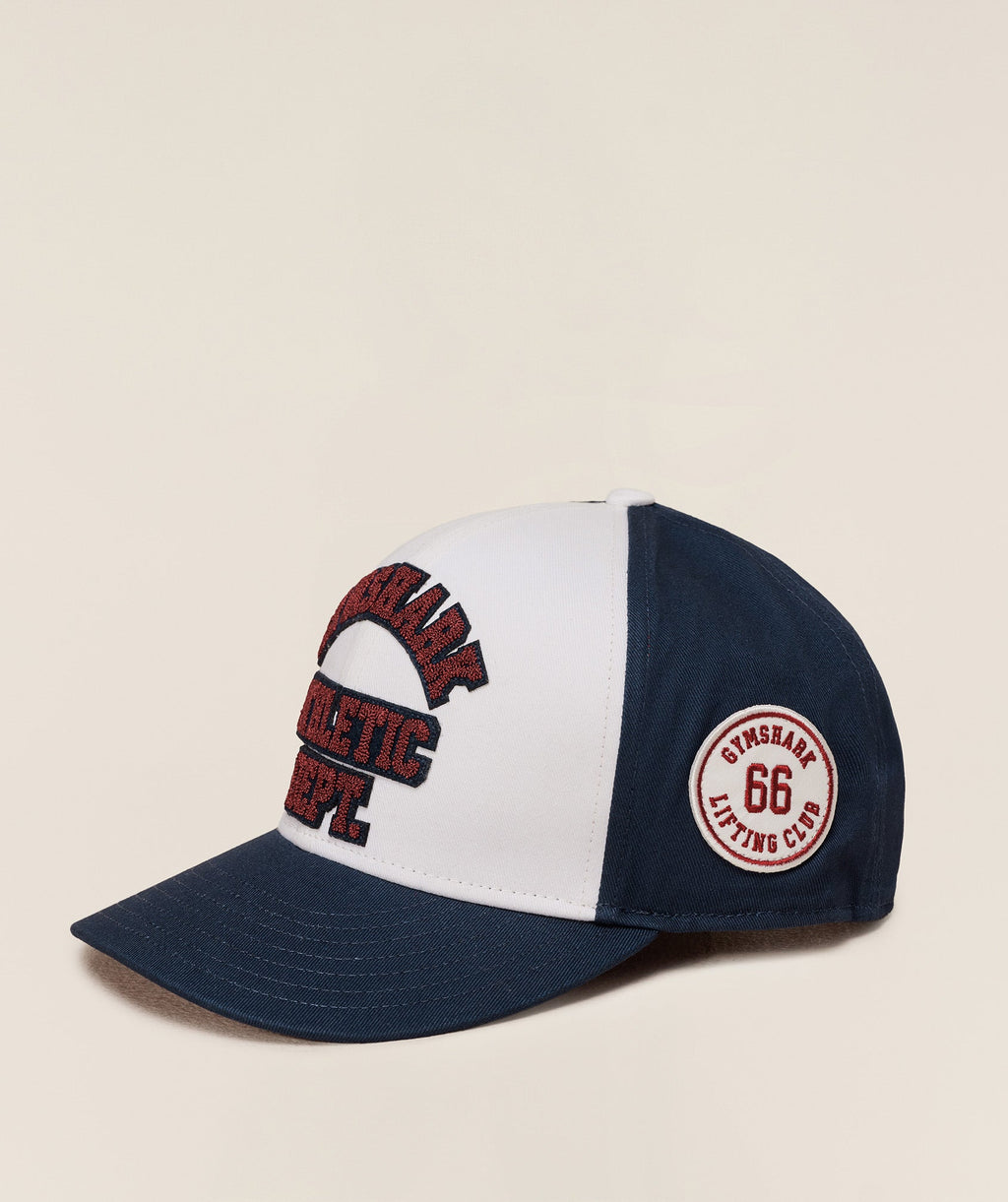 gymshark-6-panel-collegiate-trucker-headwear-blue-aw25
