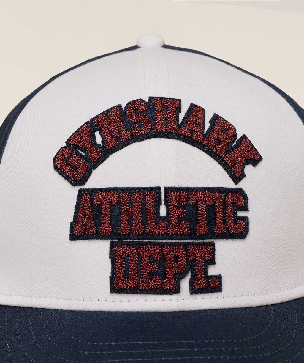gymshark-6-panel-collegiate-trucker-headwear-blue-aw25