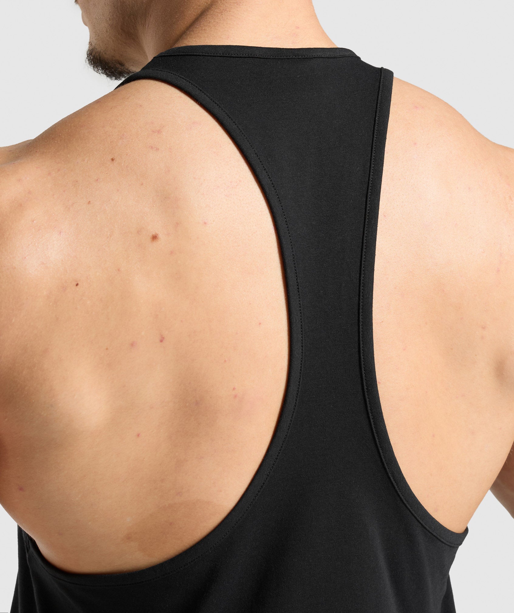 gymshark-critical-stringer-sleeveless-tops-black-ss25