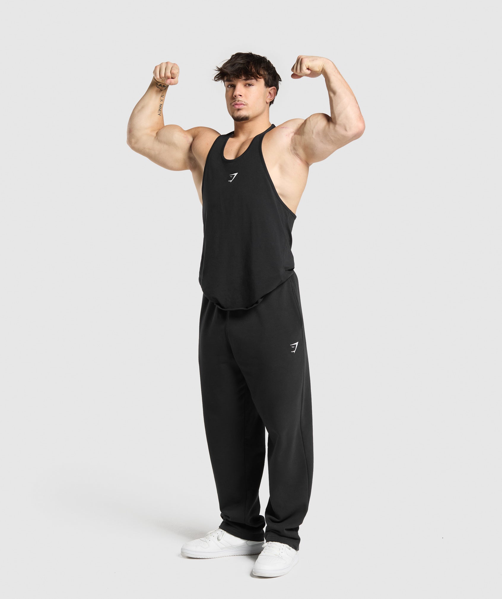 gymshark-critical-stringer-sleeveless-tops-black-ss25