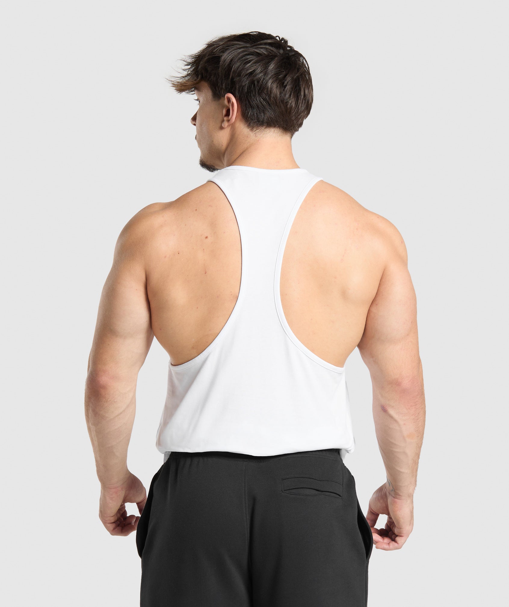gymshark-critical-stringer-sleeveless-tops-white-ss25